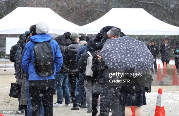 People line up for trial tickets before the verdict in the Kyoto Animation arson murder case in Kyoto on January 25, 2024. A Japanese court found...