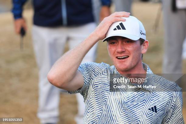 Nick Dunlap of the United States reacts after winning the The American Express at Pete Dye Stadium Course on January 21, 2024 in La Quinta,...