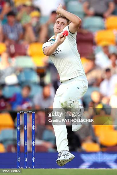 Cameron Green of Australia bowls during day one of the second cricket Test match between Australia and West Indies at the Gabba in Brisbane on...