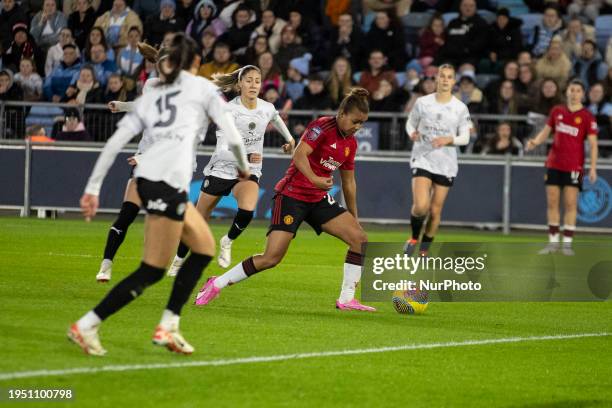 Nikita Parris, wearing jersey number 22 for Manchester United WFC, is in action during the FA Women's League Cup Group B match between Manchester...