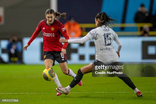 Hannah Blundell, #6 of Manchester United WFC, is being tackled by Leila Ouahabi, #15 of Manchester City, during the FA Women's League Cup Group B...