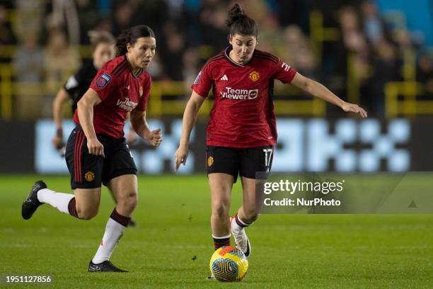 Lucia Garcia, wearing the number 17 jersey for Manchester United WFC, is playing in the FA Women's League Cup Group B match between Manchester City...