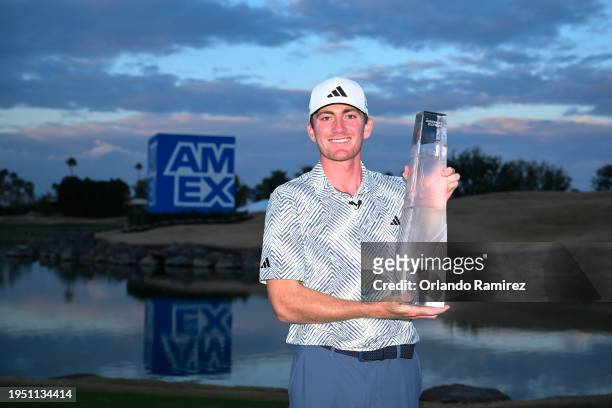 Nick Dunlap of the United States poses for a photo with the trophy after winning The American Express at Pete Dye Stadium Course on January 21, 2024...