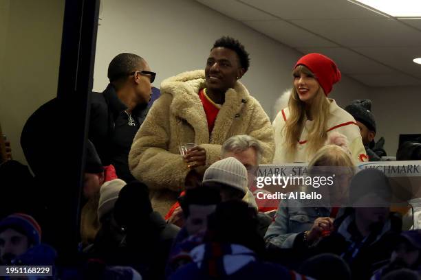 Jerrod Carmichael and singer-songwriter Taylor Swift the second quarter in the AFC Divisional Playoff game between the Kansas City Chiefs and the...