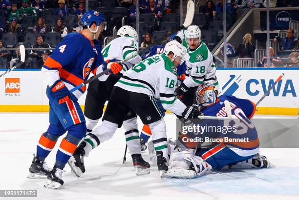 Ilya Sorokin of the New York Islanders defends the net against Joe Pavelski and the Dallas Stars at UBS Arena on January 21, 2024 in Elmont, New York.