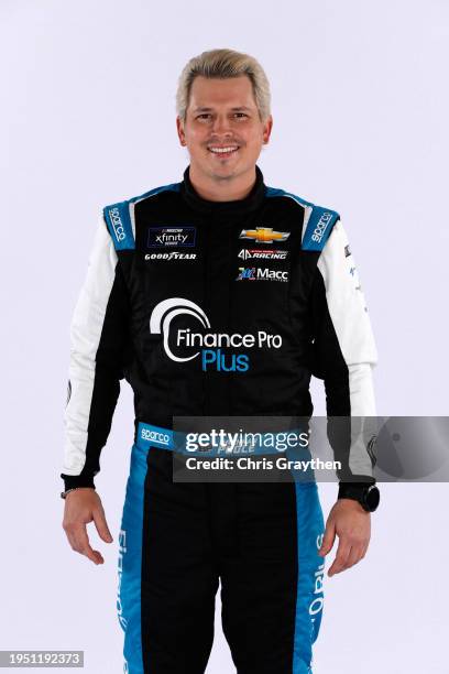 Driver Brennan Poole poses for a photo during NASCAR Production Days at the Charlotte Convention Center on January 17, 2024 in Charlotte, North...