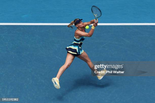 Dayana Yastremska of Ukraine plays a backhand during their round four singles match against Victoria Azarenka during the 2024 Australian Open at...