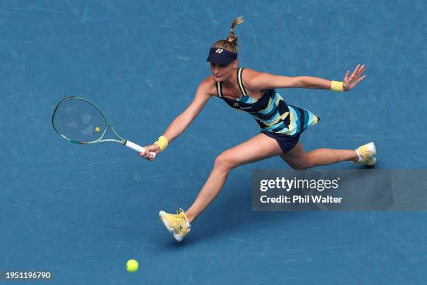 Dayana Yastremska of Ukraine plays a forehand during their round four singles match against Victoria Azarenka during the 2024 Australian Open at...