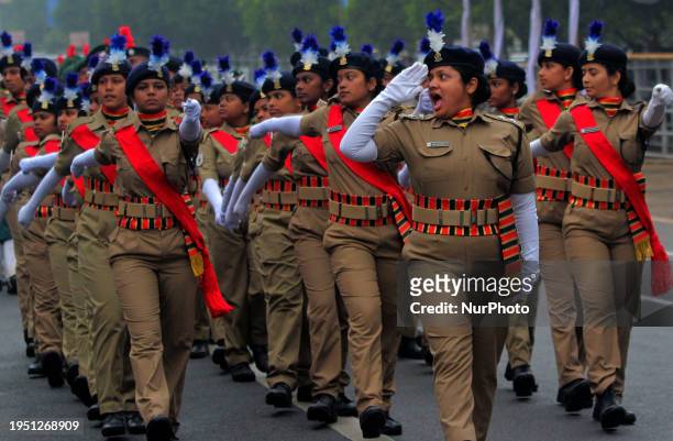State police officials and other school students are seen at the full-dress rehearsal on the eve of India's Republic Day parade rehearsal in...
