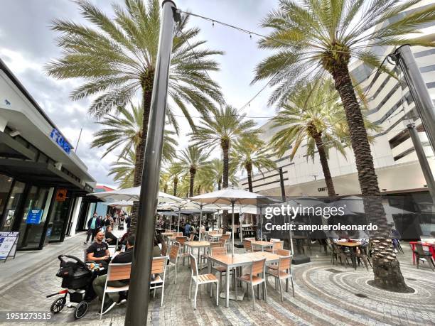 national and international tourist enjoying holidays vacations at coral gables, miami, florida, usa. - wynwood stock pictures, royalty-free photos & images
