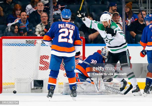 Jamie Benn of the Dallas Stars celebrates a second period goal by Nils Lundkvist against Ilya Sorokin of the New York Islanders at UBS Arena on...