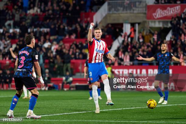 Artem Dovbyk of Girona FC celebrates after scoring his team's first goal during the LaLiga EA Sports match between Girona FC and Sevilla FC at...