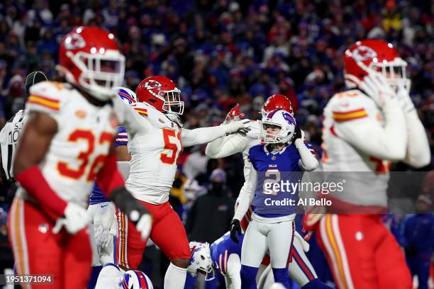 Mike Danna of the Kansas City Chiefs celebrates after Tyler Bass of the Buffalo Bills missed a 44 yard field goal attempt during the fourth quarter...