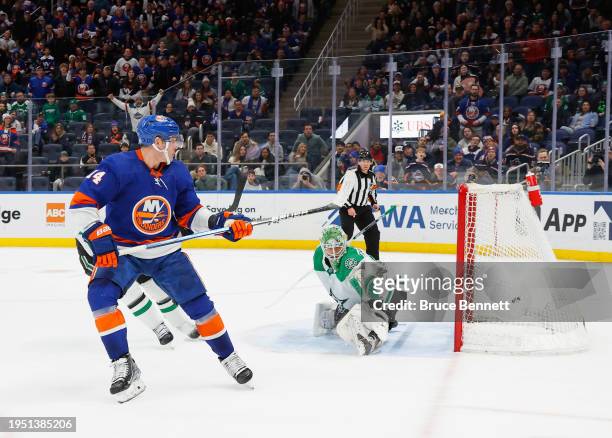 Bo Horvat of the New York Islanders scores the game-winning goal at 41 seconds of overtime against the Dallas Stars at UBS Arena on January 21, 2024...
