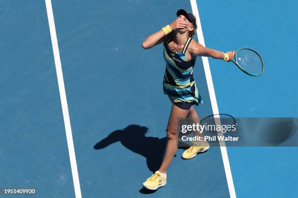 Dayana Yastremska of Ukraine celebrates winning match point in their round four singles match against Victoria Azarenka during the 2024 Australian...