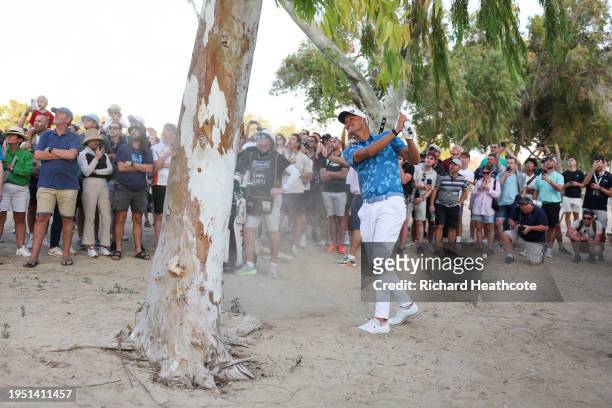 Adrian Meronk of Poland plays from the waste area on the 18th on day three of the Hero Dubai Desert Classic at Emirates Golf Club on January 20, 2024...