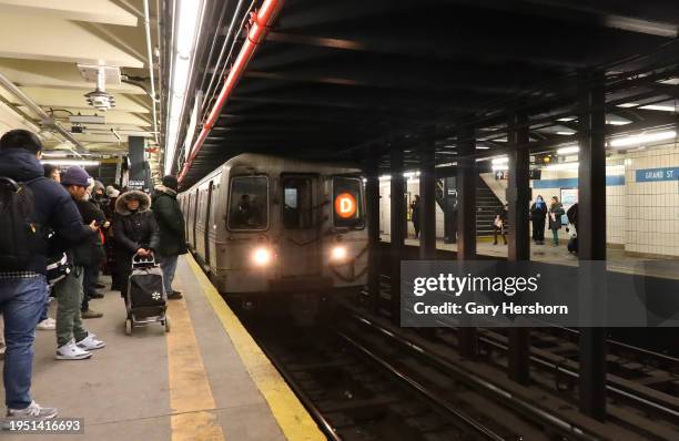 Train arrives at the Grand Street subway station on January 21 in New York City.