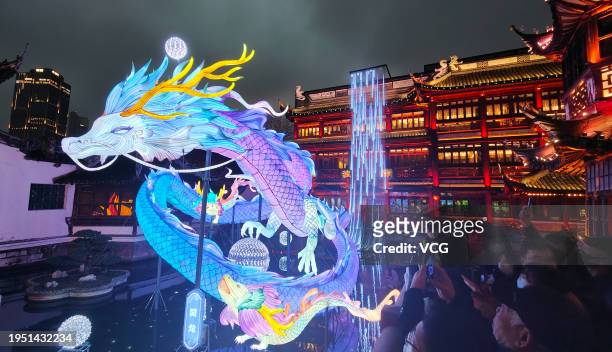 Tourists visit the Yuyuan Garden Lantern Show ahead of Chinese New Year, the Year of the Dragon, on January 21, 2024 in Shanghai, China. The annual...