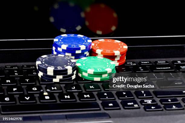 online gambling - computer keyboard and poker chips - world series of poker stock pictures, royalty-free photos & images