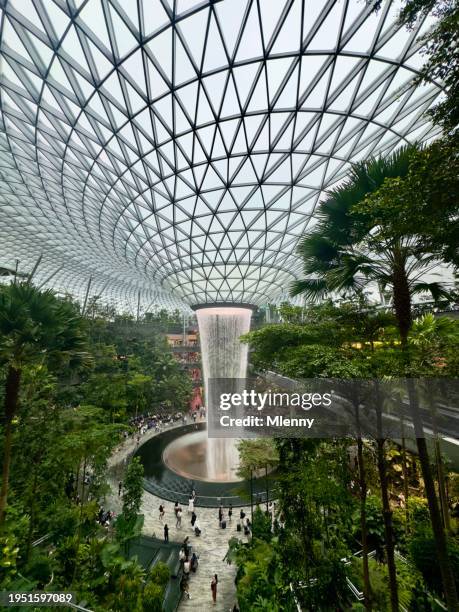 changi airport the jewel singapore modern architecture - singapore city people stock pictures, royalty-free photos & images