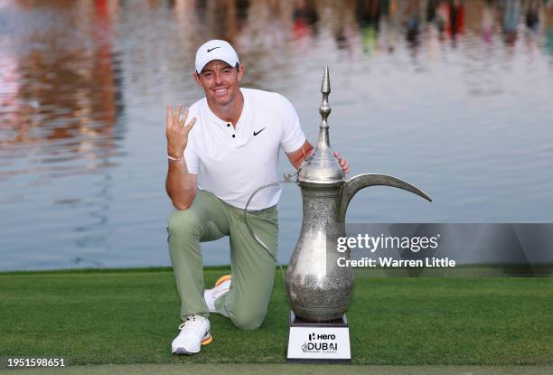 Rory McIlroy of Northern Ireland poses with the trophy after winning the Hero Dubai Desert Classic at Emirates Golf Club on January 21, 2024 in...