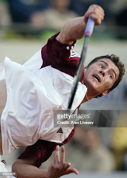 Marat Safin of Russia serves during his Quarter-Final match against Gaston Gaudio of Argentina in the ATP Seat Open held at the Real Club de Tenis in...