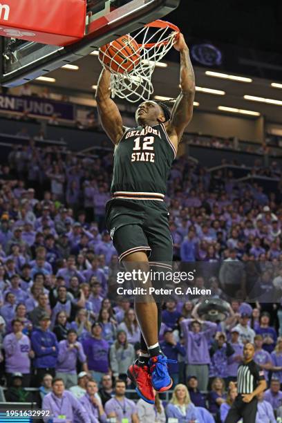 Javon Small of the Oklahoma State Cowboys go up for a dunk against the Kansas State Wildcats in the first half at Bramlage Coliseum on January 20,...