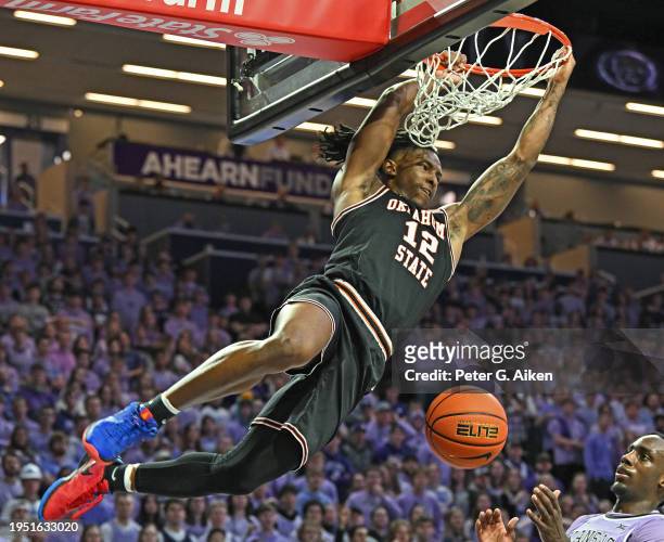 Javon Small of the Oklahoma State Cowboys scores with a dunk against the Kansas State Wildcats in the first half at Bramlage Coliseum on January 20,...