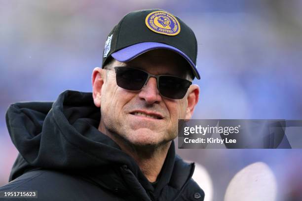 Coach Jim Harbaugh of the Michigan Wolverines attends the AFC Divisional Playoff game between the Baltimore Ravens and the Houston Texans at M&T Bank...
