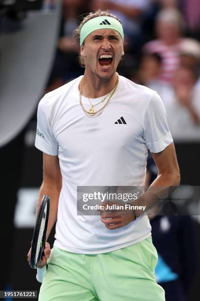 Alexander Zverev of Germany celebrates winning the third set during their round four singles match against Cameron Norrie of United Kingdom during...