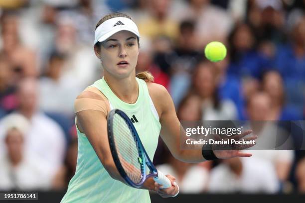 Anna Kalinskaya plays a forehand in their fourth round singles match against Jasmine Paolini of Italy during the 2024 Australian Open at Melbourne...