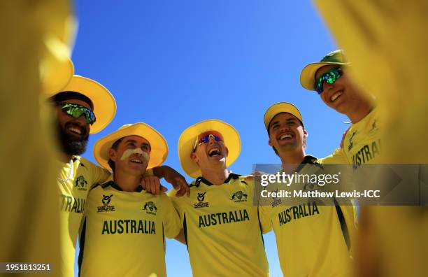 Players of Australia huddle during the ICC U19 Men's Cricket World Cup South Africa 2024 match between Australia and Namibia at Diamond Oval on...