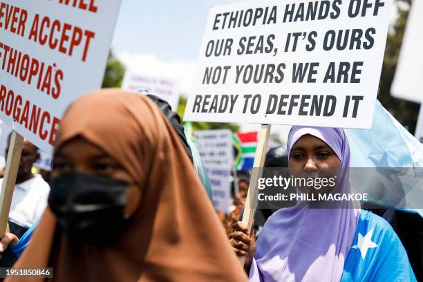 Members of the Somalian community living in South Africa demonstrate outside the Department of International Relations and Cooperation in Pretoria on...