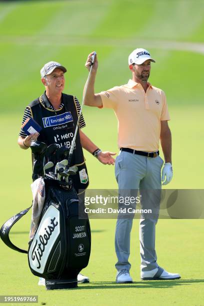 Scott Jamieson of Scotland plays his second shot on the first hole during the final round of the Hero Dubai Desert Classic on The Majlis Course at...