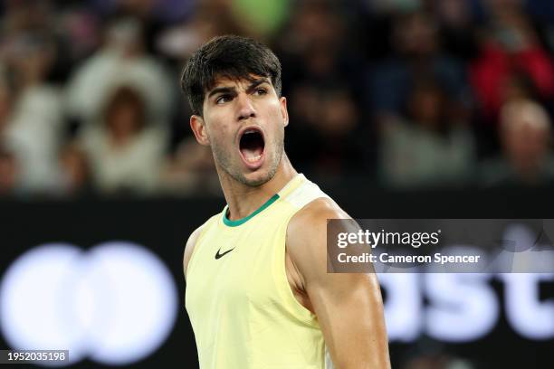 Carlos Alcaraz of Spain celebrates match point during their fourth round singles match against Miomir Kecmanovic of Serbia during the 2024 Australian...