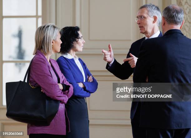 Defence minister Ludivine Dedonder, Foreign minister Hadja Lahbib and NATO Secretary General Jens Stoltenberg pictured during a new year's reception...