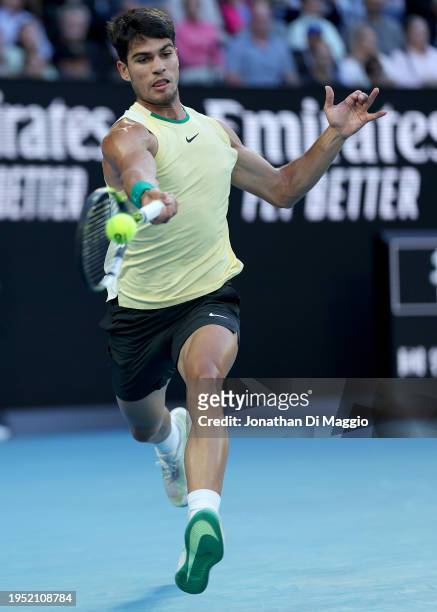 Carlos Alcaraz of Spain plays a forehand during their fourth round singles match against Miomir Kecmanovic of Serbia during the 2024 Australian Open...