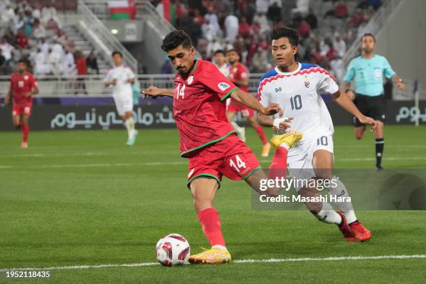 Ahmed Al Kaabi of Oman in action during the AFC Asian Cup Group F match between Oman and Thailand at Abdullah Bin Khalifa Stadium on January 21, 2024...