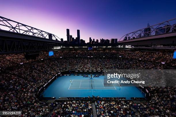 General sunset view of Rod Laver Arena during their fourth round singles match between Carlos Alcaraz of Spain and Miomir Kecmanovic of Serbia during...