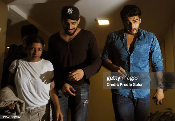 Zoya Akhtar, Sidharth Malhotra and Arjun Kapoor attend the special screening of film`Gone Girl`on October 17, 2014 in Mumbai, India (Photo by Pro dip...