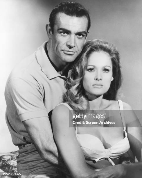Sean Connery embraces Ursula Andress in a publicity for the 1962 James Bond film 'Dr No'.