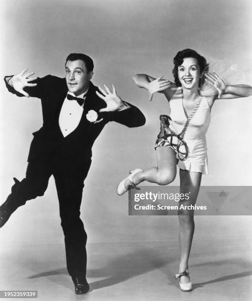 Singing in the Rain' Gene Kelly and Debbie Reynolds perform Charleston dance routine in the 1952 musical.