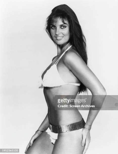 Caroline Munro in bikini for publicity portrait in the 1977 James Bond film 'The Spy Who Love Me'.
