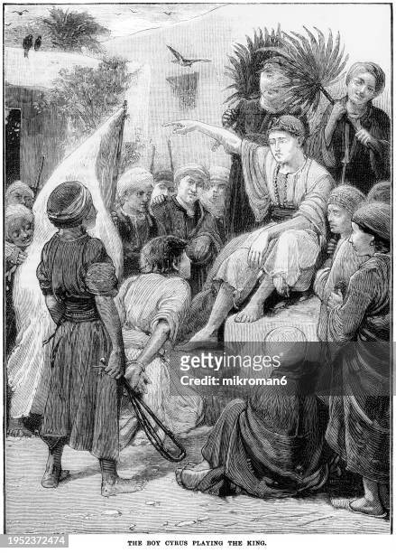 old engraved illustration of the boy cyrus playing the king - king royal person stock pictures, royalty-free photos & images