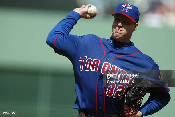 Roy Halladay of the Toronto Blue Jays throws a pitch during the game against the Boston Red Sox at Fenway Park on April 20, 2003 in Boston,...