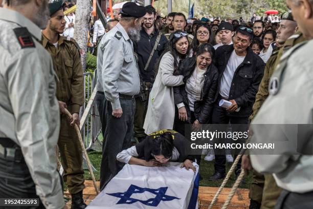 Family members of Israeli-Filipino soldier Cedric Green , one of 21 soldiers killed in a single incident while in combat in the Gaza Strip on January...