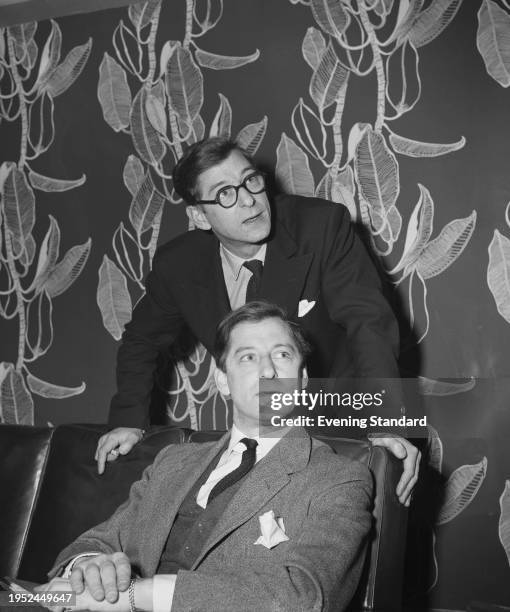 Filmmakers Roy Boulting and John Boulting , known as the Boulting brothers, promoting their new film 'Brothers in Law', April 9th 1957.