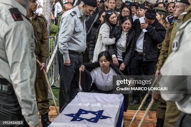 Family members of Israeli-Filipino soldier Cedric Green , one of 21 soldiers killed in a single incident while in combat in the Gaza Strip on January...