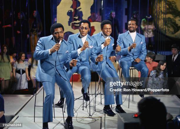 American Vocal Group Four Tops perform on the set of a pop music television show in London circa 1970. Members of the group are, from left, Lawrence...