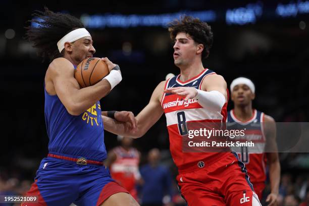 Zeke Nnaji of the Denver Nuggets dribbles against the Washington Wizards during the first half at Capital One Arena on January 21, 2024 in...